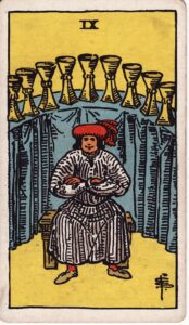 Moon in Gemini to Cancer, Punarvasu to Pushya, conjunct Jupiter, exalted, the Nine of Cups tarot card.